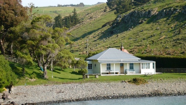 The cottage at Little Pigeon Bay, pictured before the tsunami.